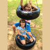 children playing on two tier Twister tire Swing
