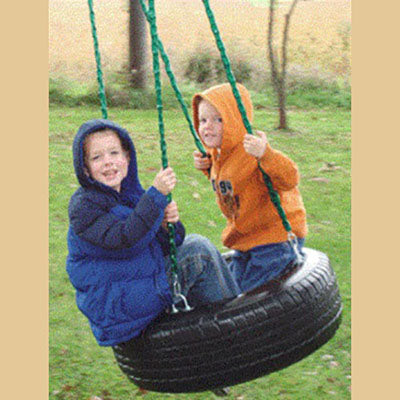 Children playing on Deluxe 4-Chain Tire Swing 