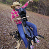 child swinging on Roping Pony Tire Swing