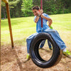 Child Playing on Old-Fashioned Vertical Tire Swing 